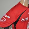 เสื้อซ้อมทีมชาติไทย เสื้อฟุตซอลทีมชาติไทย เสื้อทีมชาติไทย เสื้ออุ่นเครื่องฟุตซอลทีมชาติไทย 2012-2013 แกรนด์สปอร์ต สีแดง