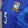 เสื้อฟุตซอลทีมชาติไทย แกรนด์สปอร์ต (Grand Sport) ปี 2012 สีน้ำเงิน สกรีนเบอร์ 5 จิรวัฒน์ สอนวิเชียร