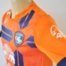 เสื้อสุพรรณบุรี เอฟซี ปี 2013-2014 ทีมเยือน สีส้ม สปอนเซอร์ครบ